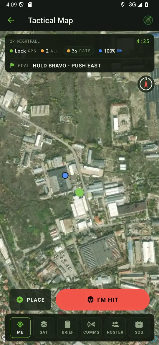 The tactical map at night: satellite view, the goal bar reading HOLD BRAVO - PUSH EAST, and two live squad dots.