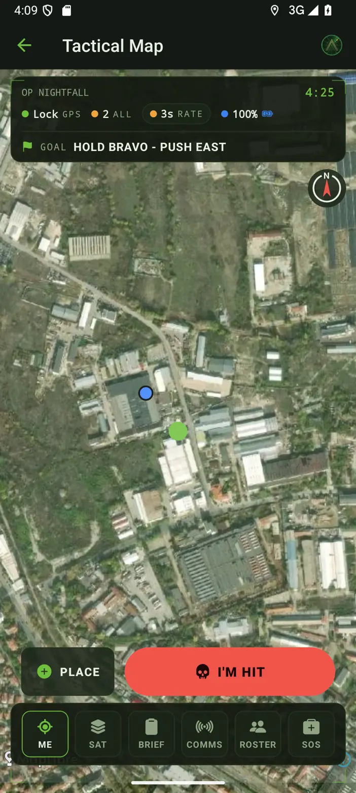 The tactical map at night: satellite view, the goal bar reading HOLD BRAVO - PUSH EAST, and two live squad dots.